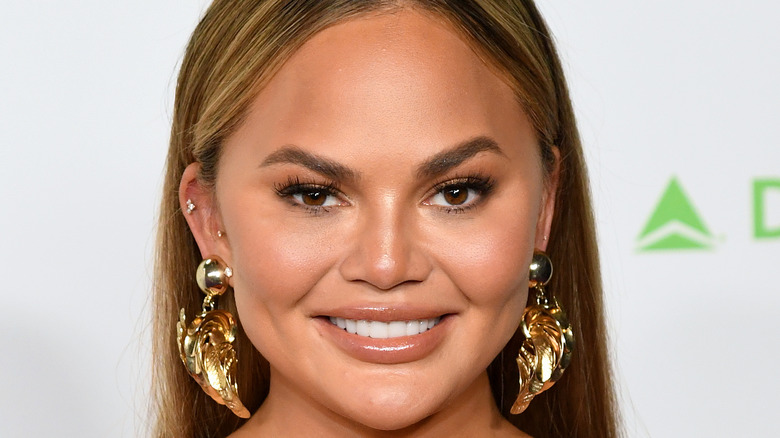 Chrissy Teigen smiling, 2021