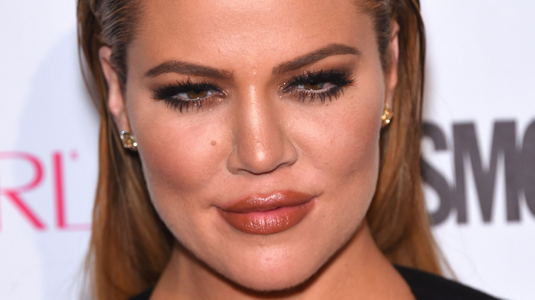 Khloé Kardashian with peach lipstick