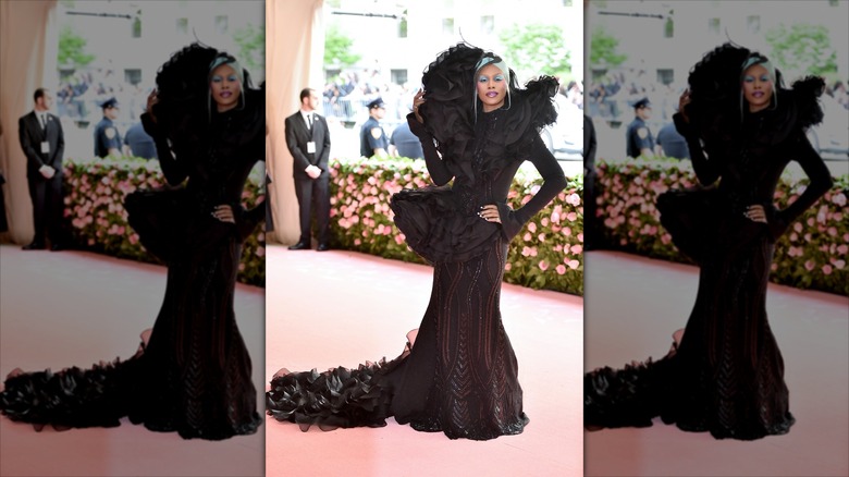 Laverne Cox wearing a dramatic black gown at the Met Gala