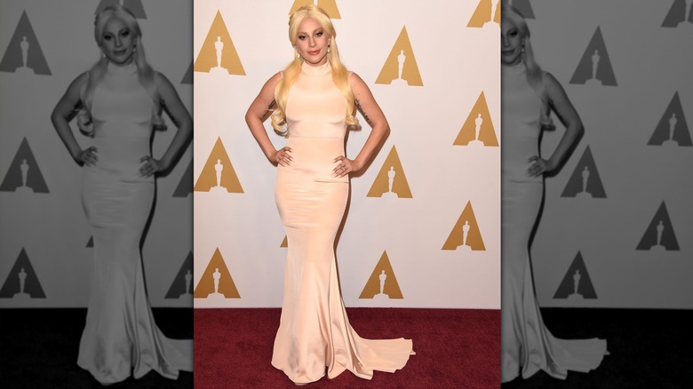 Lady Gaga wearing a nude-colored Christian Siriano dress at the 2016 Oscars luncheon