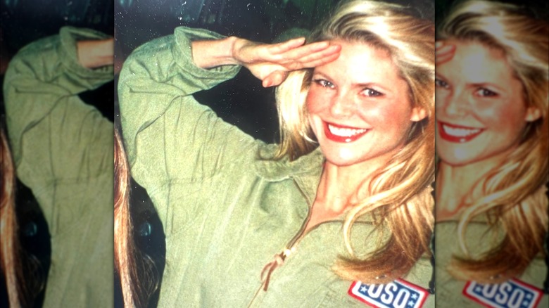 Christie Brinkley saluting to the camera