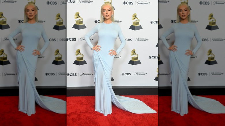 Christina Aguilera posing on Grammys step-and-repeat in 2024