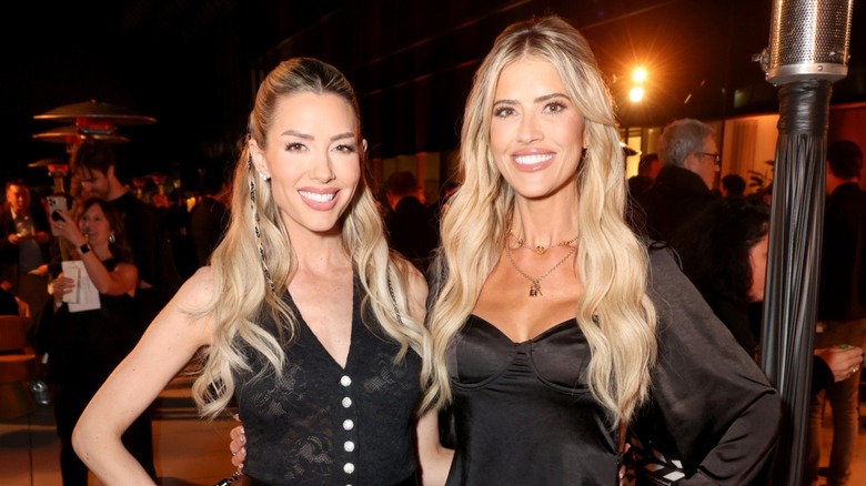 Heather Rae El Moussa and Christina Haack smiling side-by-side in similar blond hairstyles (2025)