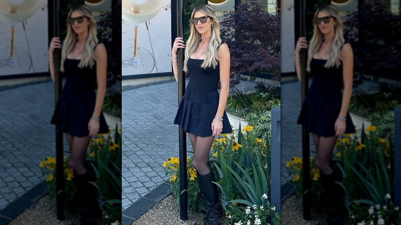 Christina Haack standing by yellow flowers in Paris