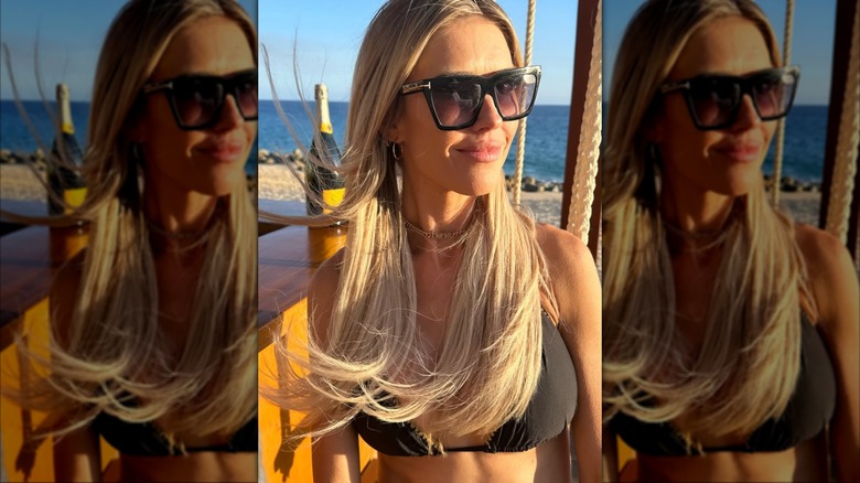 A selfie of Christina Haack near a beach
