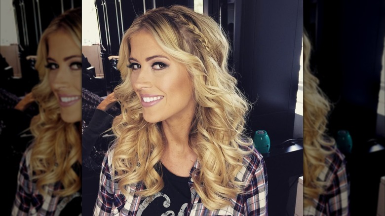Christina Haack at a hair salon with curly hair and braids