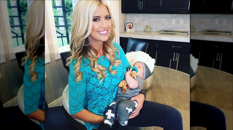 Christina Haack holding her son in 2016