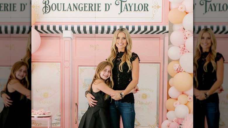 Christina Haack and Taylor El Moussa posing at a party