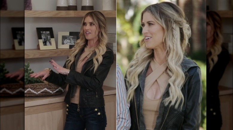 Christina Haack wearing a leather jacket over a beige top