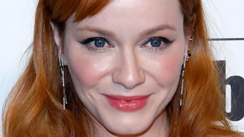 Christina Hendricks poses at a red carpet event