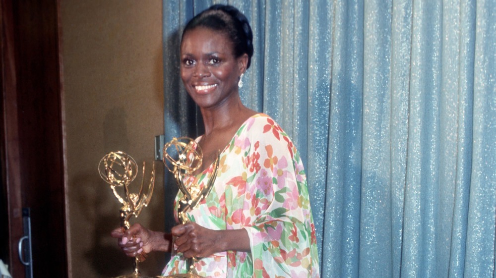 Cicely Tyson poses with her awards