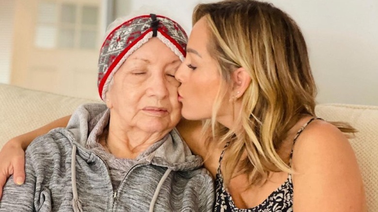Clare Crawley kisses her mom Lilia