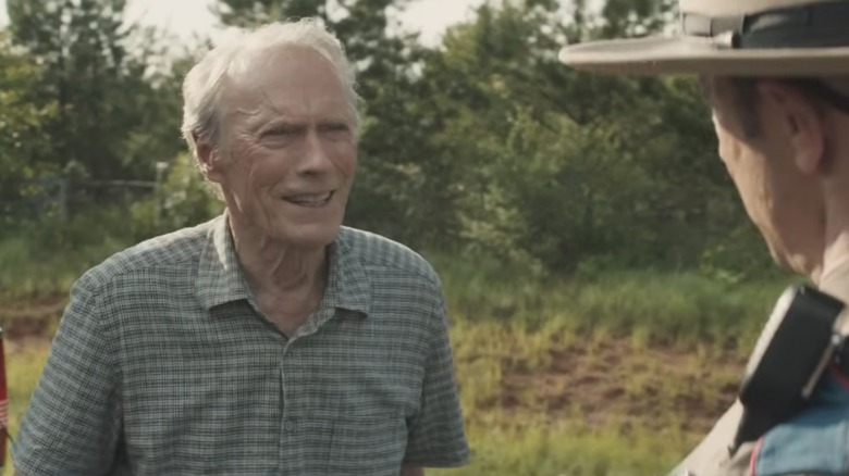 Clint Eastwood smiling at police officer in "The Mule"