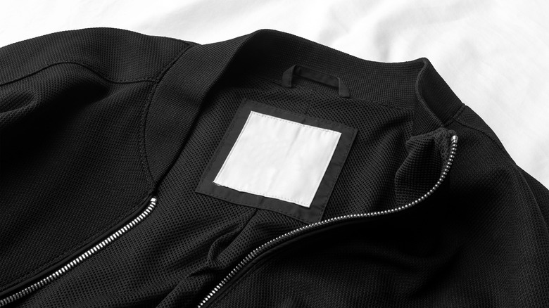 black zip-front sweatshirt with blank tag