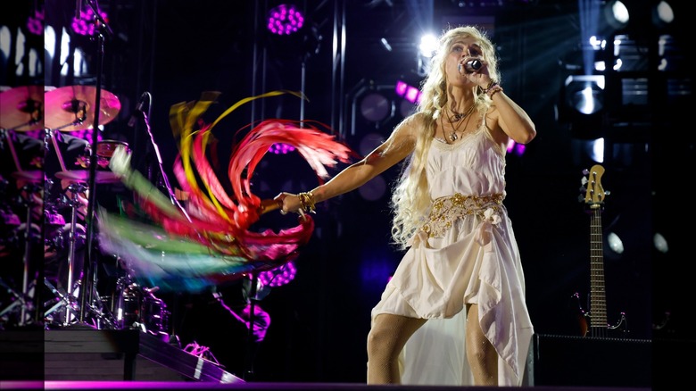 Clare Bowen singing in white dress