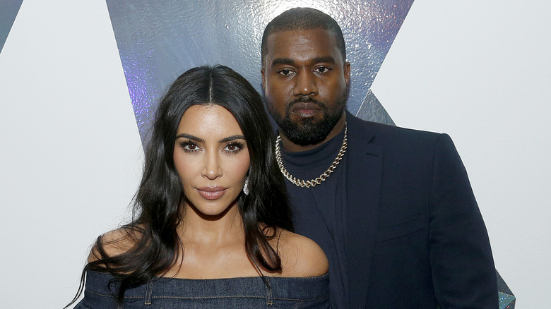 Kim Kardashian and Kanye West posing together
