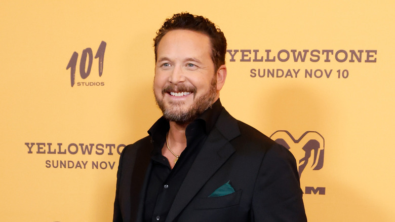 Cole Hauser posing and smiling at the "Yellowstone" season 5, part 2 premiere in New York.