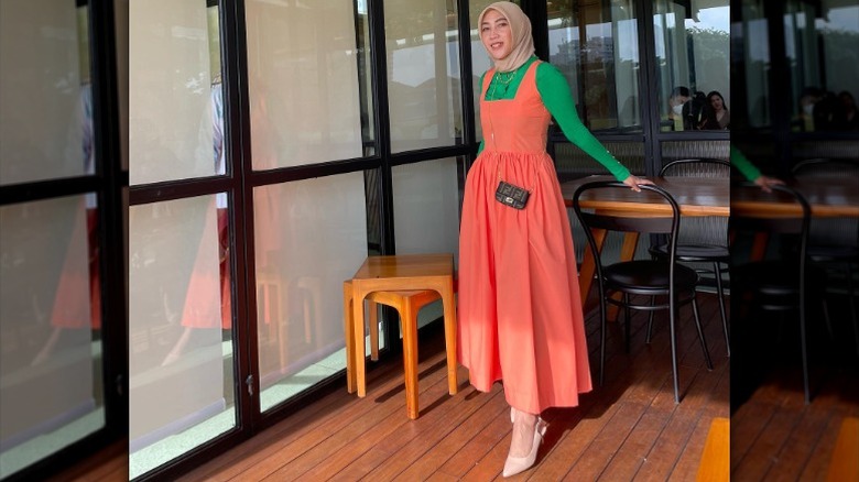 orange dress with green turtleneck