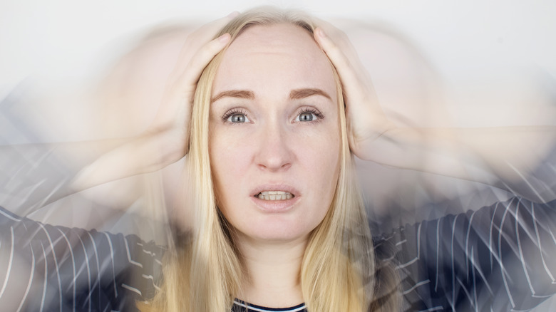 Woman feeling dizzy