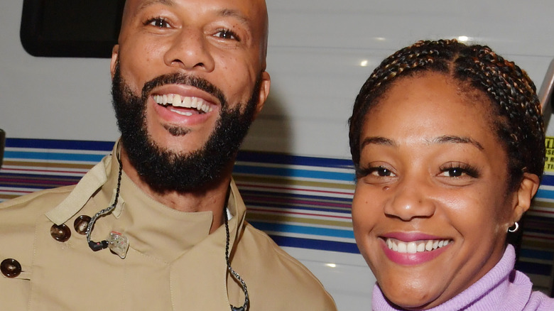 Tiffany Haddish and Common smile together