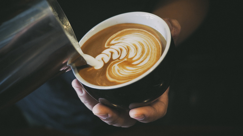 Barista creating latte art