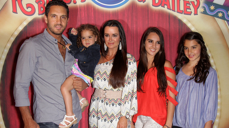 Kyle Richards, Mauricio Umansky, three daughters