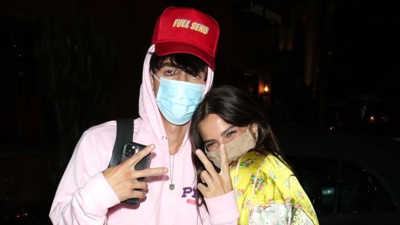 Addison Rae and Bryce Hall in masks