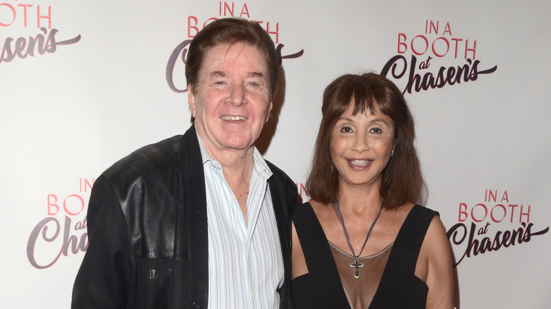 Bobby Sherman posing with Brigitte Poublon at an event in 2018