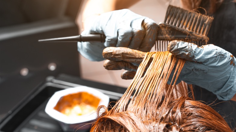 Dye being applied to hair 