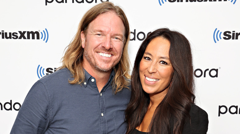 Chip and Joanna Gaines smiling at event