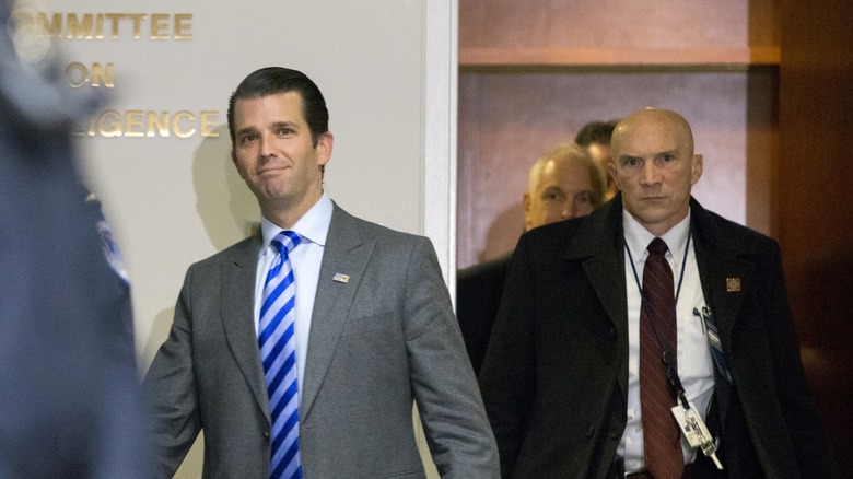 Donald Trump Jr. leaves a Senate Intelligence Committee hearing about his contacts with Russia