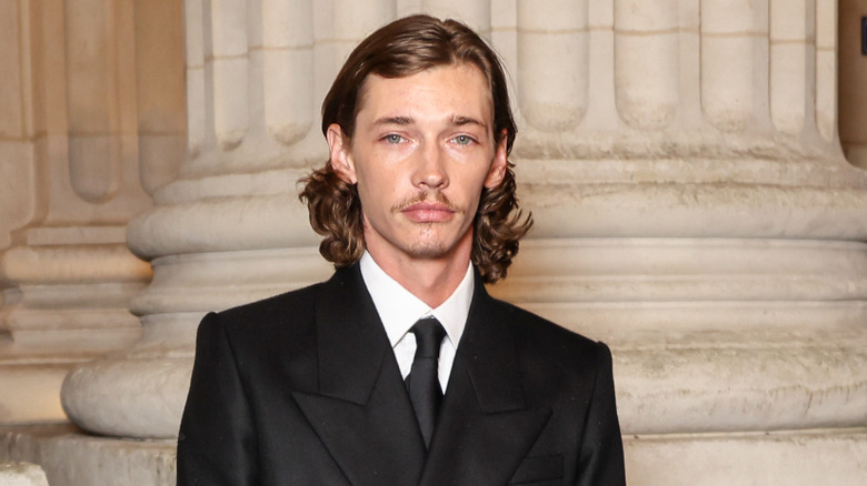 Jacob Lofland posing in a suit