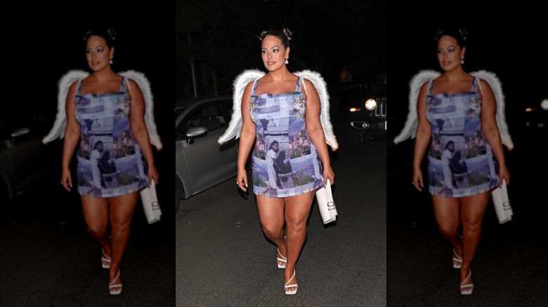 Ashely Graham attending Halloween party in angel costume