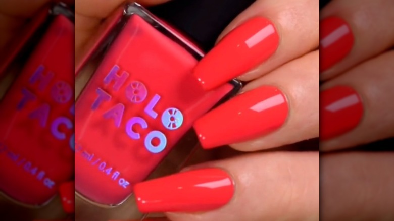 Reddish-coral nails