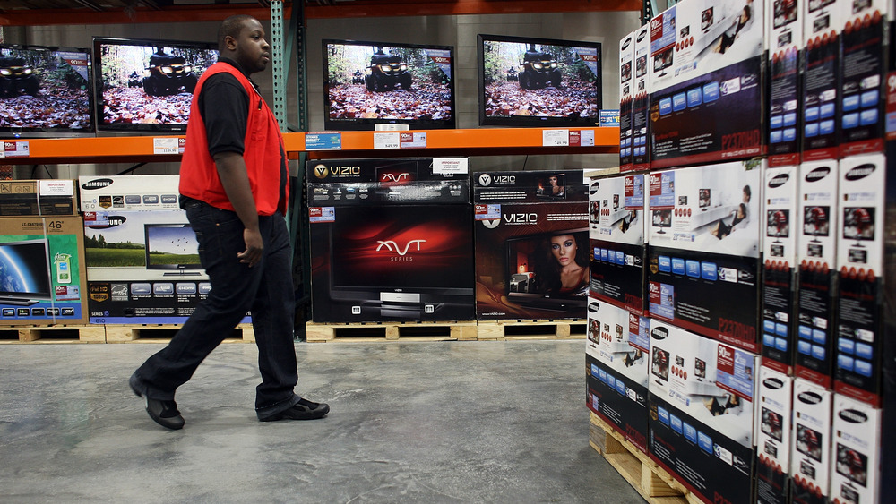 Costco employee walks floor