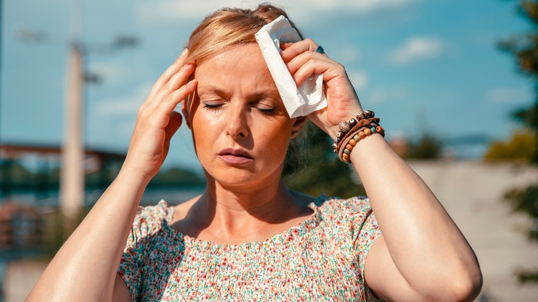 Woman having hot flash