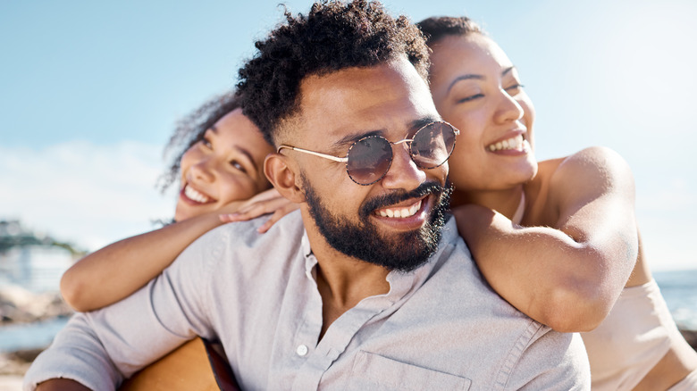 Three people at the beach