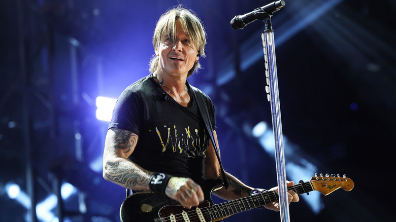 Keith Urban performing on stage
