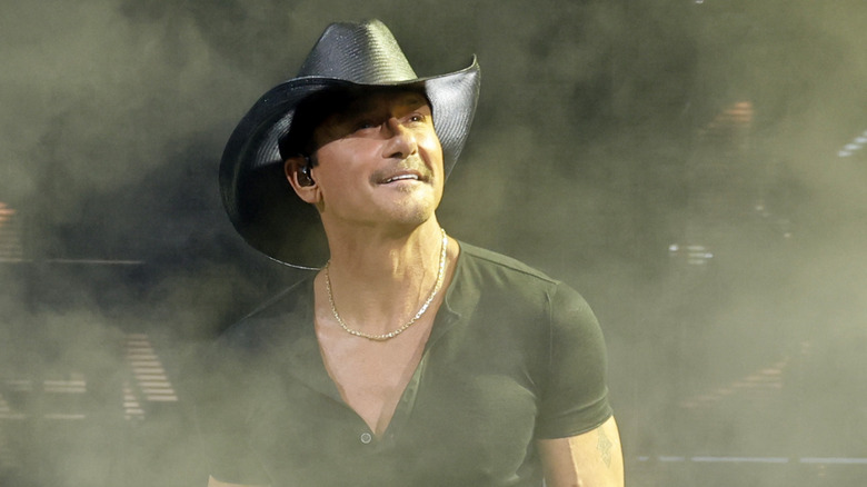 Tim McGraw standing on stage