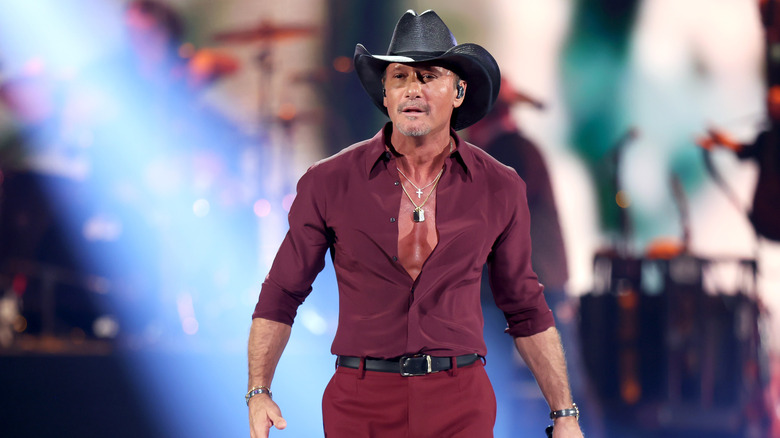 Tim McGraw standing on stage