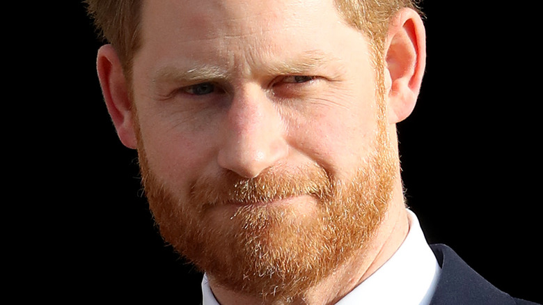 Prince Harry pursing his lips