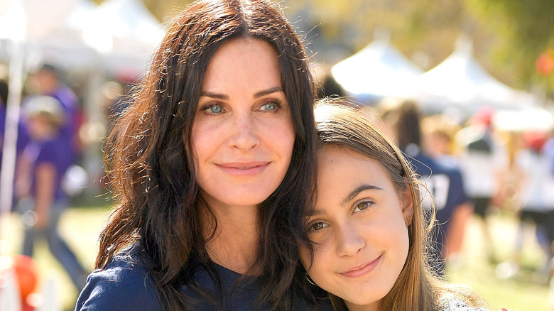 Courteney Cox hugging daughter Coco