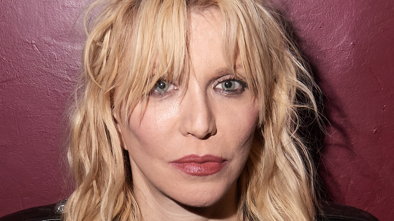 Courtney Love poses for a photo