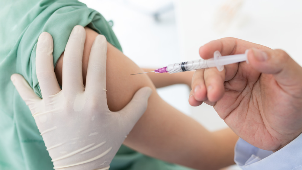 person getting a flu shot