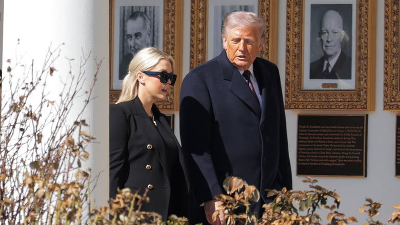 Karoline Leavitt walking with Donald Trump