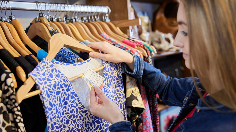 Woman shops at a thrift store