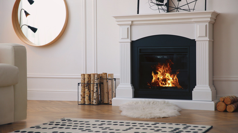 Fireplace in white room