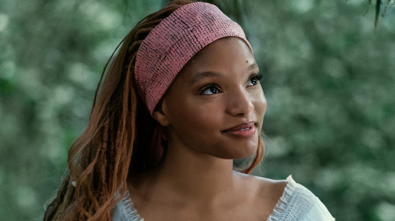 Halle Bailey smiling as Ariel