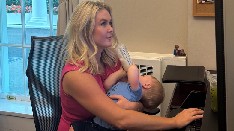 Karoline Leavitt holding her baby
