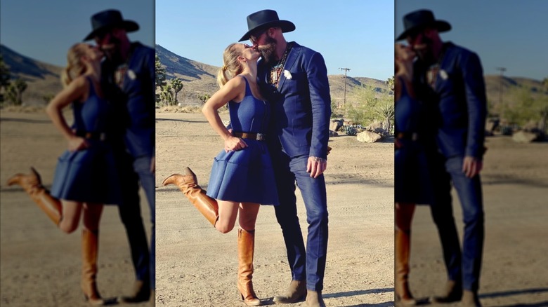 A.J. Cook and husband Nathan Andersen share a kiss in an Instagram photo